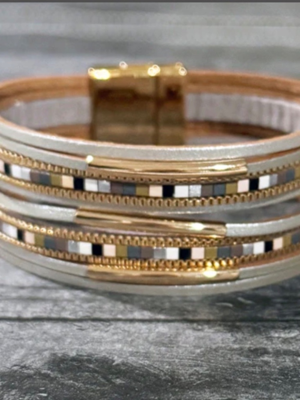 7.5" in length (7" fastened), the Neutral Metallic Leather Wrap Bracelet - Picture 3 of 4